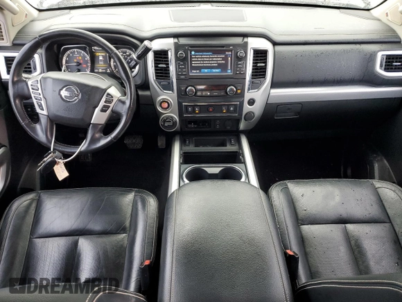 2018 Nissan Titan Pro-4X z VIN 1N6AA1E51JN536680, wystawiony jako Copart lot #82361724 z przebiegiem 98 699 mil mil oraz Szkoda całkowita • Salvage title. Historia ofert i sprzedaży dostępna na DreamBid. Obrazek 8.