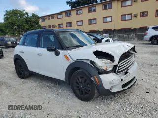 2013 MINI Countryman with VIN WMWZB3C5XDWM31715, listed as a Copart auction lot 57028565 with 95,453 mi miles and Salvage title. Bid and sale history available at DreamBid. Image 4.