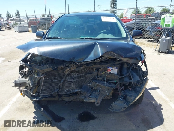 2010 Toyota Corolla with VIN 1NXBU4EE3AZ307385, listed as a IAAI auction lot 42465219 with 201,105 mi miles and . Bid and sale history available at DreamBid. Image 13.