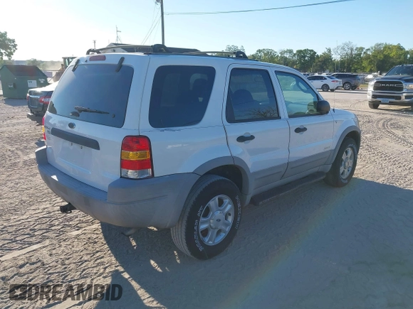 2002 Ford Escape XLT with VIN 1FMCU03112KC92704, listed as a IAAI auction lot 41807550 with 105,762 mi miles and . Bid and sale history available at DreamBid. Image 4.