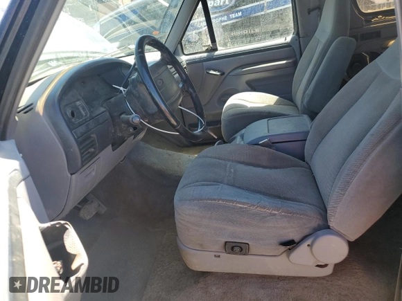 1996 Ford Bronco Custom with VIN 1FMEU15H6TLB18163, listed as a Copart auction lot 51802494 with 151,134 mi miles and Salvage Title. Bid and sale history available at DreamBid. Image 7.