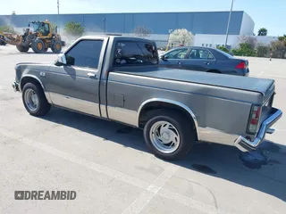1987 GMC Sonoma with VIN 1GTBS14E2H8501760, listed as a IAAI auction lot 41852033 with 175,529 mi miles and . Bid and sale history available at DreamBid. Image 3.