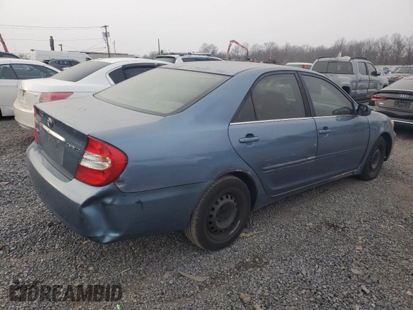 2003 Toyota Camry LE with VIN 4T1BE32K53U687513, listed as a Copart auction lot 88604195 with 242,312 mi miles and Clean Title. Bid and sale history available at DreamBid. Image 3.