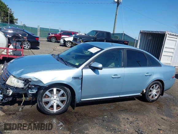 2008 Ford Taurus SEL with VIN 1FAHP24WX8G186437, listed as a IAAI auction lot 41934754 with 186,347 mi miles. Bid and sale history available at carsss.com. Image 14.