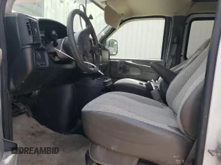 2005 Chevrolet Express Cargo with VIN 1GCFG15T051142218, listed as a Copart auction lot 57409005 with 185,725 mi miles and Salvage title. Bid and sale history available at DreamBid. Image 7.