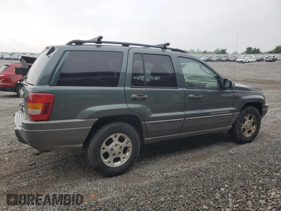 2002 Jeep Grand Cherokee z VIN 1J4GX38S72C152046, wystawiony jako Copart lot #57963095 z przebiegiem 204 576 mil mil oraz Szkoda całkowita • Salvage title. Historia ofert i sprzedaży dostępna na DreamBid. Obrazek 3.