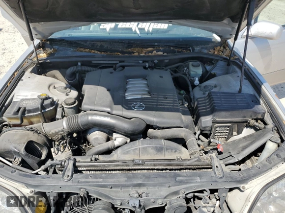 1999 Lexus LS 400 z VIN JT8BH28F0X0161141, wystawiony jako Copart lot #52638575 z przebiegiem 250 602 mil mil oraz Szkoda całkowita • Salvage title. Historia ofert i sprzedaży dostępna na DreamBid. Obrazek 11.