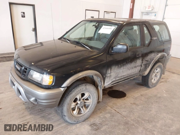 2002 Isuzu Rodeo with VIN 4S2CM57W124335034, listed as a IAAI auction lot 42446556 with 214,718 mi miles and . Bid and sale history available at DreamBid. Image 2.