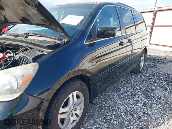 2007 Honda Odyssey EX-L with VIN 5FNRL38767B139398, listed as a IAAI auction lot 42044526 with 191,041 mi miles. Bid and sale history available at carsss.com. Image 6.