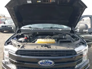 2020 Ford F-150 XL z VIN 1FTFW1E57LFC70041, wystawiony jako IAAI lot #41773623 z przebiegiem 30 860 mil mil oraz . Historia ofert i sprzedaży dostępna na DreamBid. Obrazek 10.