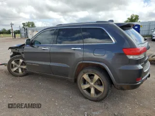 2015 Jeep Grand Cherokee Overland with VIN 1C4RJFCT4FC813510, listed as a Copart auction lot 41466395 with 135,124 mi miles and Salvage Title. Bid and sale history available at carsss.com. Image 2.