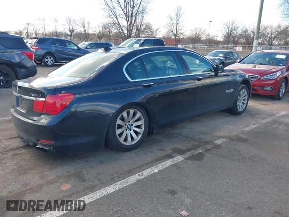 2011 BMW 7 Series 750Li xDrive with VIN WBAKC8C52BC434392, listed as a IAAI auction lot 41501172 with 99,389 mi miles. Bid and sale history available at carsss.com. Image 4.
