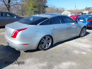 2014 Jaguar XJ z VIN SAJWJ1CD0E8V63989, wystawiony jako IAAI lot #41643513 z przebiegiem 119 924 mil mil oraz . Historia ofert i sprzedaży dostępna na DreamBid. Obrazek 4.