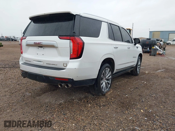 2021 GMC Yukon Denali with VIN 1GKS2DKL0MR178210, listed as a IAAI auction lot 41934532 with 91,785 mi miles. Bid and sale history available at carsss.com. Image 4.
