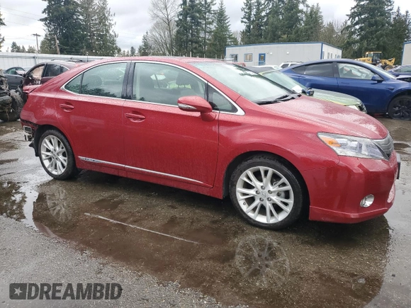 2010 Lexus HS 250h with VIN JTHBB1BA7A2015288, listed as a Copart auction lot 47601955 with 129,392 mi miles and Salvage Title. Bid and sale history available at DreamBid. Image 4.