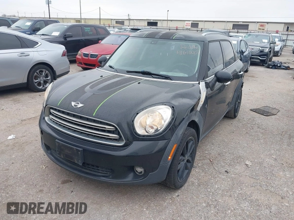 2015 MINI Countryman with VIN WMWZB3C53FWR43819, listed as a IAAI auction lot 41610007 with 134,185 mi miles and . Bid and sale history available at DreamBid. Image 2.