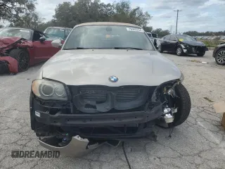 2009 BMW 1 Series 128i z VIN WBAUL73539VJ76952, wystawiony jako Copart lot #76992254 z przebiegiem Nie podano mil oraz Szkody całkowita. Historia ofert i sprzedaży dostępna na DreamBid. Obrazek 5.
