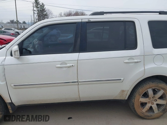 2013 Honda Pilot Touring with VIN 5FNYF3H98DB025516, listed as a IAAI auction lot 41767097 with 202,908 mi miles and . Bid and sale history available at DreamBid. Image 14.