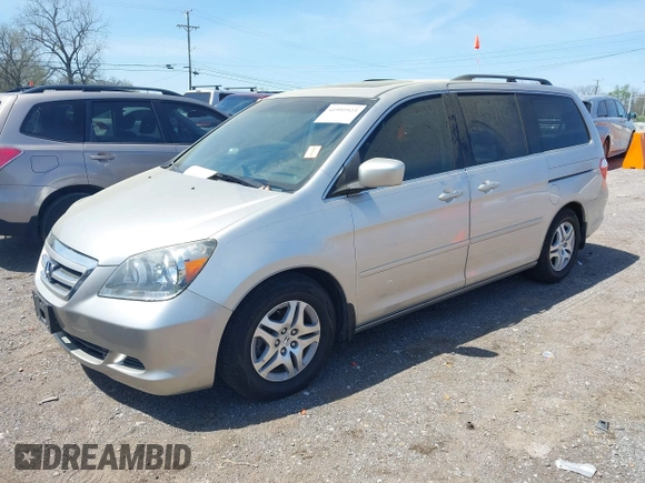 2007 Honda Odyssey EX-L with VIN 5FNRL386X7B103852, listed as a IAAI auction lot 41995923 with 78,092 mi miles and . Bid and sale history available at DreamBid. Image 2.