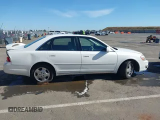 2004 Toyota Avalon XL z VIN 4T1BF28B54U362005, wystawiony jako IAAI lot #42174414 z przebiegiem 378 173 mil mil oraz . Historia ofert i sprzedaży dostępna na DreamBid. Obrazek 13.