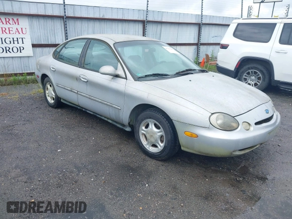 1997 Ford Taurus GL z VIN 1FALP52UXVG180596, wystawiony jako IAAI lot #42463461 z przebiegiem 190 419 mil mil oraz . Historia ofert i sprzedaży dostępna na DreamBid. Obrazek 1.