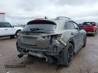 2014 Infiniti QX70 z VIN JN8CS1MU3EM451745, wystawiony jako IAAI lot #42203922 z przebiegiem 144 990 mil mil oraz . Historia ofert i sprzedaży dostępna na DreamBid. Obrazek 4.