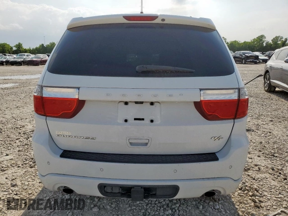 2013 Dodge Durango R/T with VIN 1C4SDHCT7DC697592, listed as a Copart auction lot 59778425 with 150,904 mi miles and Salvage title. Bid and sale history available at DreamBid. Image 6.