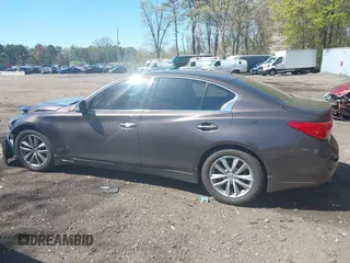 2014 Infiniti Q50 Premium with VIN JN1BV7ARXEM684719, listed as a IAAI auction lot 42122949 with 126,656 mi miles and . Bid and sale history available at DreamBid. Image 14.