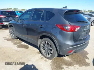 2016 Mazda CX-5 Grand Touring with VIN JM3KE2DYXG0784615, listed as a IAAI auction lot 41846853 with 72,185 mi miles. Bid and sale history available at carsss.com. Image 3.