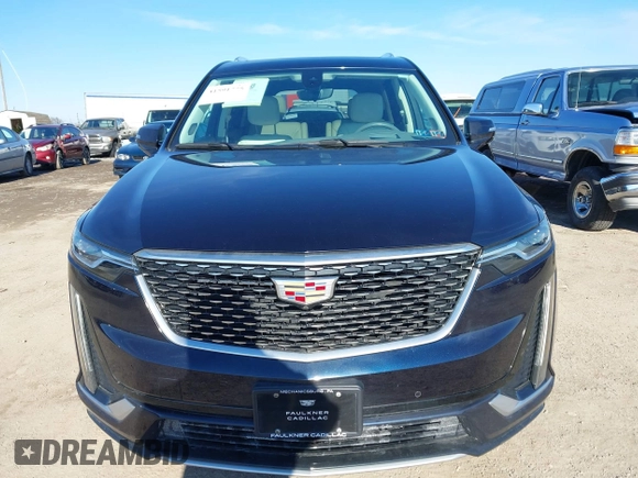 2021 Cadillac XT6 Premium Luxury z VIN 1GYKPDRS8MZ175544, wystawiony jako IAAI lot #41591775 z przebiegiem 39 290 mil mil oraz . Historia ofert i sprzedaży dostępna na DreamBid. Obrazek 12.