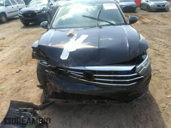 2021 Volkswagen Jetta S z VIN 3VWC57BU1MM038232, wystawiony jako IAAI lot #42196294 z przebiegiem 54 880 mil mil oraz . Historia ofert i sprzedaży dostępna na DreamBid. Obrazek 6.