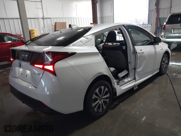 2021 Toyota Prius LE with VIN JTDL9MFU9M3025214, listed as a IAAI auction lot 41375860 with 76,259 mi miles and . Bid and sale history available at DreamBid. Image 4.