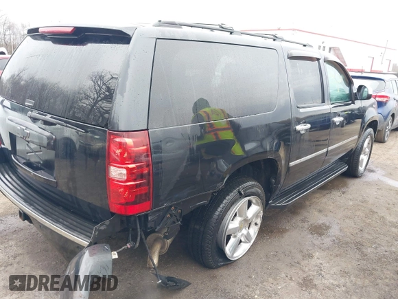 2012 Chevrolet Suburban LTZ with VIN 1GNSKKE74CR257156, listed as a IAAI auction lot 41486869 with 168,049 mi miles. Bid and sale history available at carsss.com. Image 4.