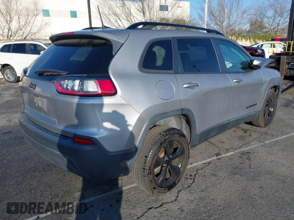 2020 Jeep Cherokee Latitude Plus with VIN 1C4PJLLB0LD500716, listed as a IAAI auction lot 41409010 with 97,848 mi miles. Bid and sale history available at carsss.com. Image 4.