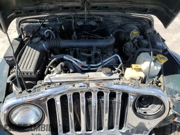 2002 Jeep Wrangler Sport с VIN 1J4FA49SX2P738105, выставлен на аукционе Copart как лот 60320775 с пробегом 402 518 миль миль и Списание • Salvage title. История ставок и продаж доступна на DreamBid. Изображение 12.