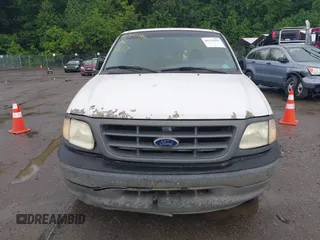 2003 Ford F-150 XL with VIN 1FTRF17203NA84217, listed as a IAAI auction lot 42324582 with 96,949 mi miles and . Bid and sale history available at DreamBid. Image 6.
