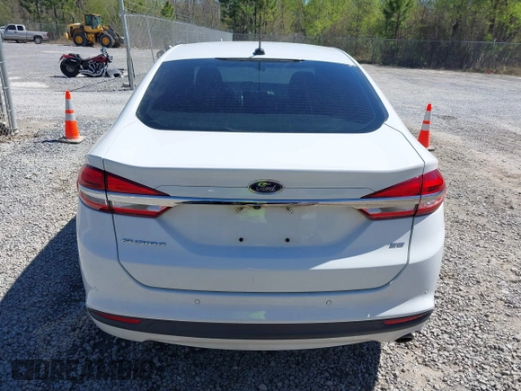 2018 Ford Fusion SE z VIN 3FA6P0H77JR142828, wystawiony jako IAAI lot #41820649 z przebiegiem 208 517 mil mil oraz . Historia ofert i sprzedaży dostępna na DreamBid. Obrazek 16.