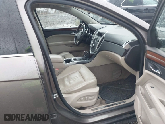 2011 Cadillac SRX Luxury Collection with VIN 3GYFNAEY9BS571833, listed as a IAAI auction lot 41983443 with 183,761 mi miles. Bid and sale history available at carsss.com. Image 5.