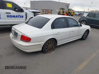 2003 Hyundai Sonata GLS with VIN KMHWF35H93A889013, listed as a IAAI auction lot 41751356 with 213,896 mi miles. Bid and sale history available at carsss.com. Image 4.