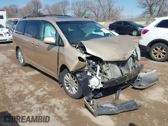 2012 Toyota Sienna XLE AAS with VIN 5TDYK3DC0CS202891, listed as a IAAI auction lot 41938594 with Not Provided miles and . Bid and sale history available at carsss.com. Image 1.