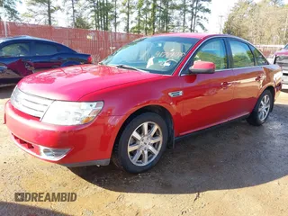2009 Ford Taurus SEL with VIN 1FAHP24W09G105298, listed as a IAAI auction lot 41749070 with 148,199 mi miles. Bid and sale history available at carsss.com. Image 2.