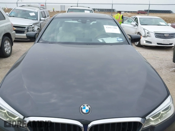 2018 BMW 5 Series 530e with VIN WBAJA9C55JB033575, listed as a IAAI auction lot 42067380 with 111,902 mi miles and . Bid and sale history available at DreamBid. Image 6.