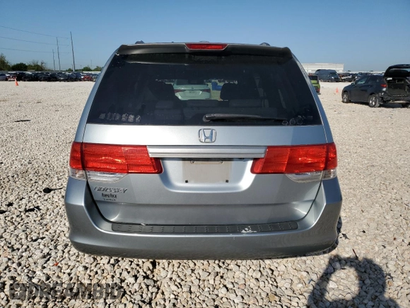 2009 Honda Odyssey EX-L with VIN 5FNRL38799B034292, listed as a Copart auction lot 52547205 with 116,658 mi miles and Salvage Title. Bid and sale history available at DreamBid. Image 6.