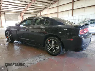 2014 Dodge Charger RT with VIN 2C3CDXDT4EH124147, listed as a Copart auction lot 65571904 with 121,538 mi miles and Salvage Title. Bid and sale history available at carsss.com. Image 2.