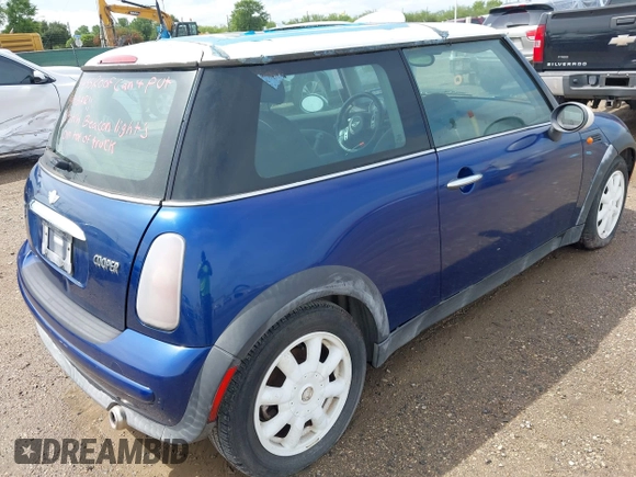 2004 MINI Hardtop with VIN WMWRC33474TJ60134, listed as a IAAI auction lot 42389410 with 183,452 mi miles and . Bid and sale history available at DreamBid. Image 4.