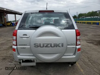 2008 Suzuki Grand Vitara w/Spare & Cargo Covers with VIN JS3TD941784100899, listed as a Copart auction lot 62581725 with 104,502 mi miles and Salvage title. Bid and sale history available at DreamBid. Image 6.