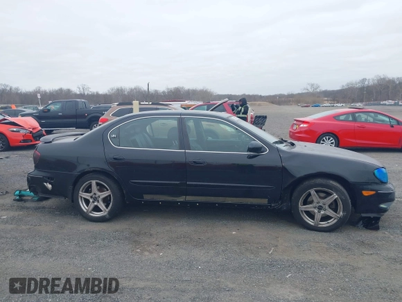 2002 Infiniti I35 Luxury z VIN JNKDA31A92T013997, wystawiony jako IAAI lot #41781369 z przebiegiem 206 413 mil mil oraz . Historia ofert i sprzedaży dostępna na DreamBid. Obrazek 13.