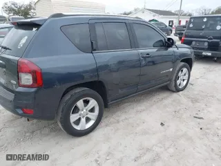 2014 Jeep Compass Latitude with VIN 1C4NJCEB7ED651270, listed as a IAAI auction lot 41561557 with 208,874 mi miles. Bid and sale history available at carsss.com. Image 4.