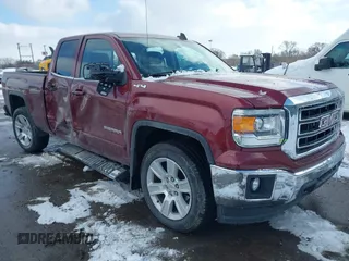 2015 GMC Sierra 1500 SLE with VIN 1GTV2UEC0FZ376468, listed as a IAAI auction lot 41611072 with 113,857 mi miles. Bid and sale history available at carsss.com. Image 1.