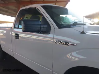 2014 Ford F-150 XL with VIN 1FTMF1CM4EKE98669, listed as a IAAI auction lot 41310314 with 133,239 mi miles. Bid and sale history available at carsss.com. Image 13.